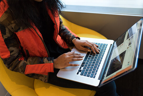 Woman reading informations about IoT security