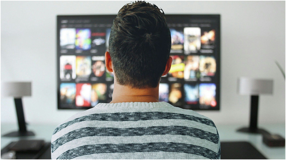 Man is watching TV
