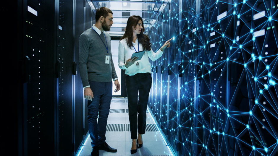 Man and woman at server room