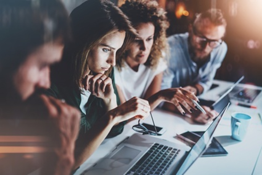 Group of people works on project
