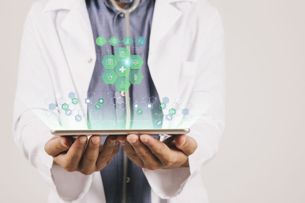 Medical banner with doctor holding tablet
